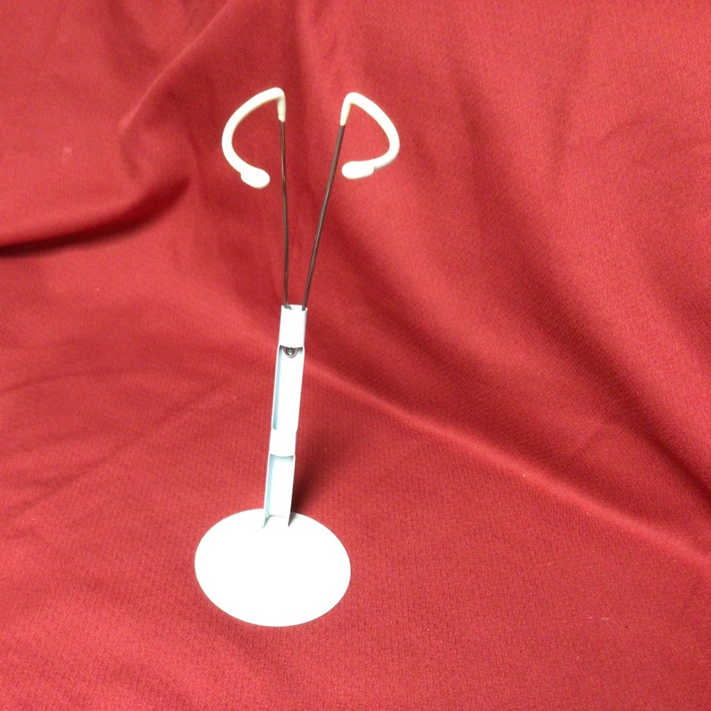 Metal adjustable doll stand